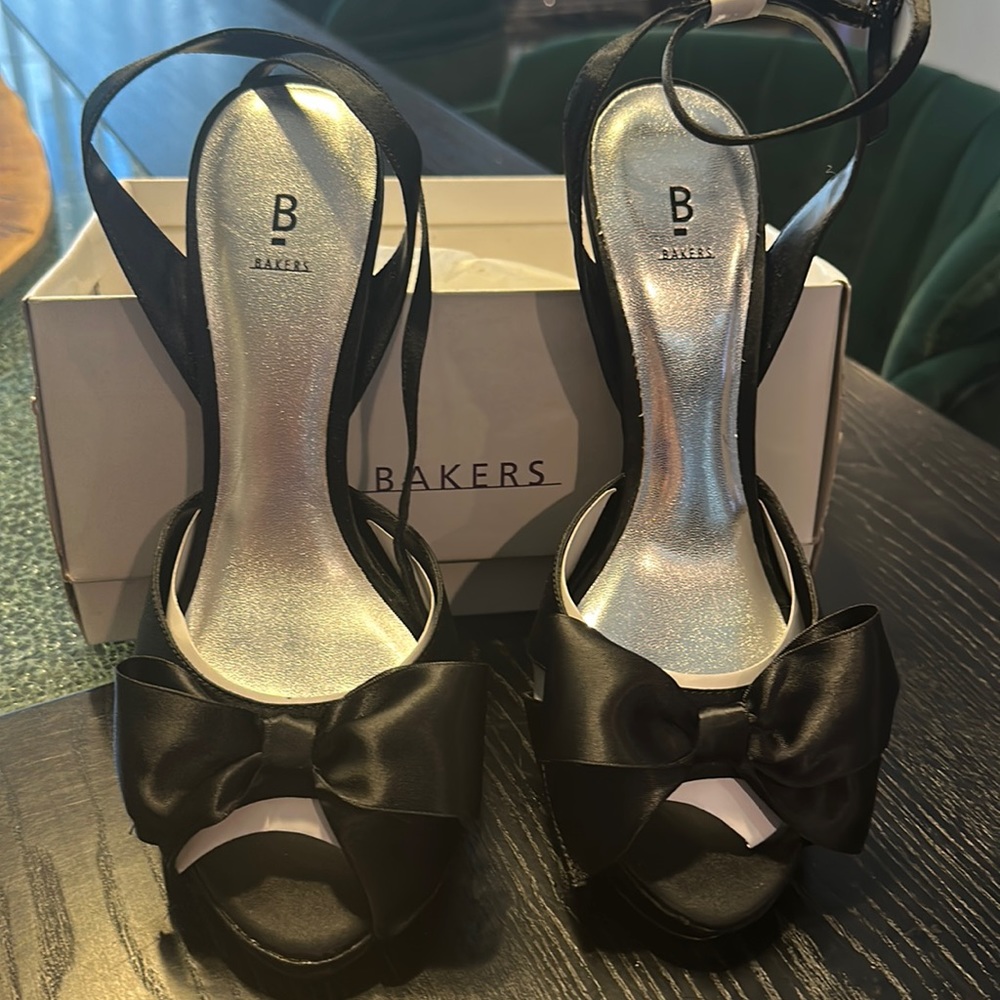 Bakers Size 9 black bow heels with ankle strap. Brand new, never worn.